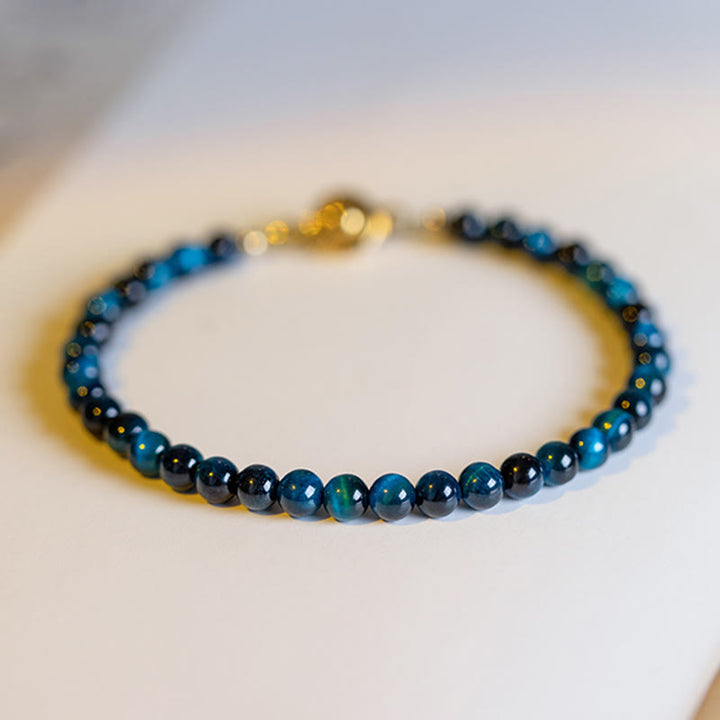Braccialetto di protezione con catena in pietra naturale occhio di tigre blu Buddha Stones