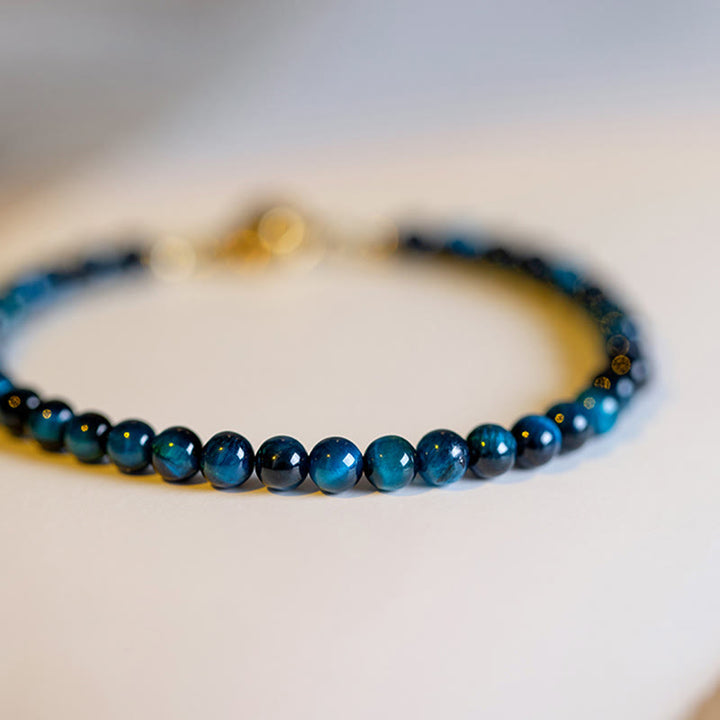 Braccialetto di protezione con catena in pietra naturale occhio di tigre blu Buddha Stones