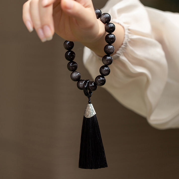 Buddha Stones Argento naturale Ossidiana lucida Ossidiana nera Leone Mala da polso Protezione Nappe Mala tascabile Decorazione per auto