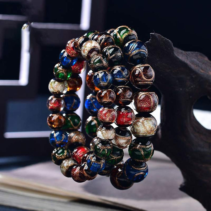Braccialetto della fortuna con perline di vetro colorate Liuli Buddha Stones