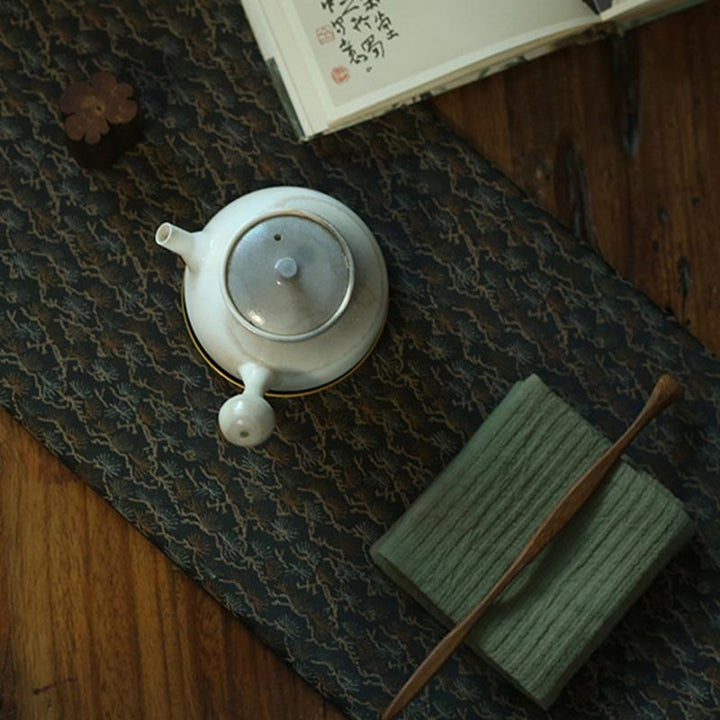 Elegante sottobicchiere per tazza da tè con motivo broccato floreale
