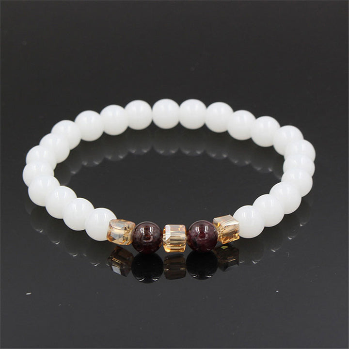 Braccialetto di protezione in giada bianca naturale Buddha Stones