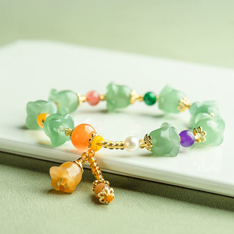 Braccialetto della fortuna con fiore di magnolia, avventurina verde Buddha Stones