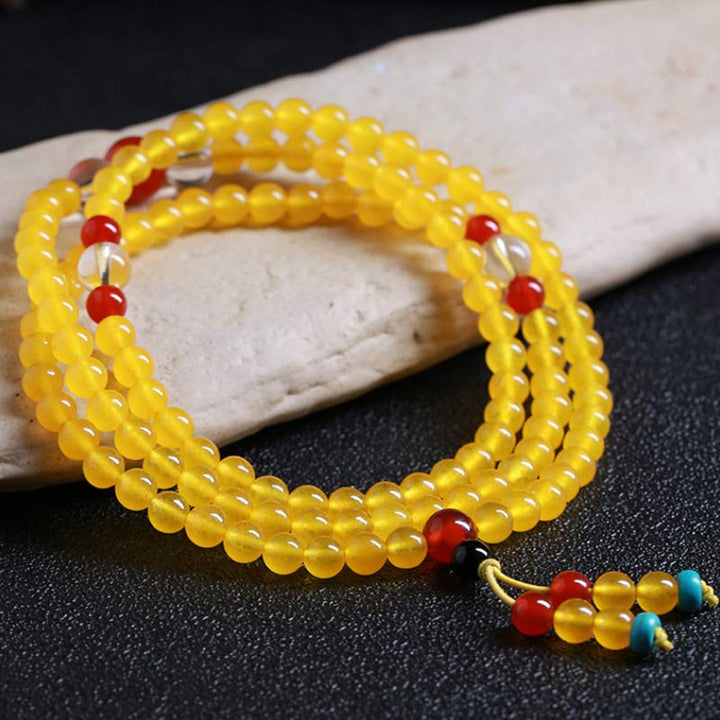 Braccialetto dell'armonia Buddha Stones 108 Mala Beads in calcedonio giallo