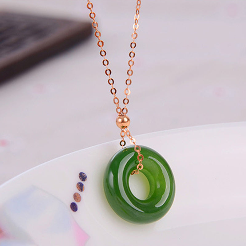 Collana con ciondolo in oro 14K con giada ciano rotonda e guarigione