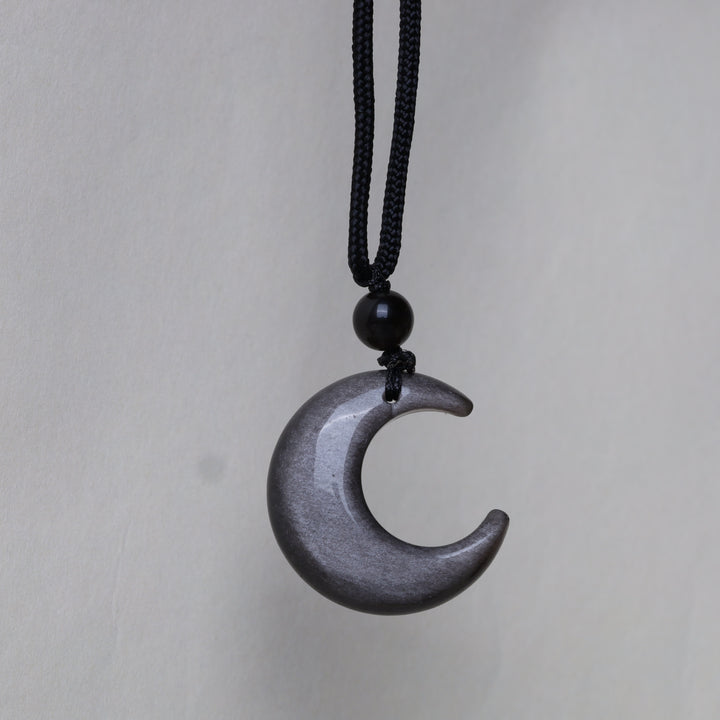 Collana con ciondolo a forma di mezzaluna stellata in ossidiana naturale Buddha Stones argento