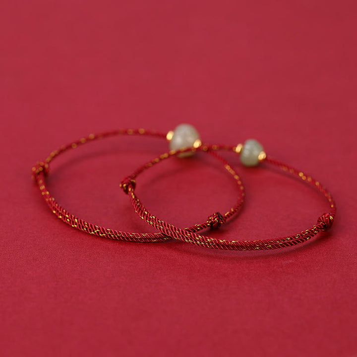 Bracciale Buddha Stones in argento sterling 925 placcato oro con giada Hetian e loto portafortuna in corda rossa