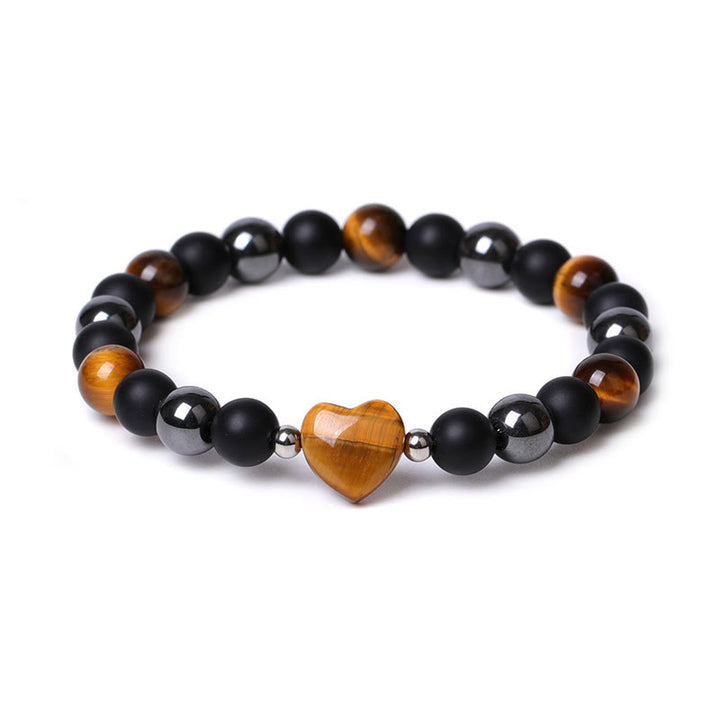 Braccialetto di protezione del cuore dell'amore di cristallo della pietra dell'occhio di tigre di onice nero Buddha Stones