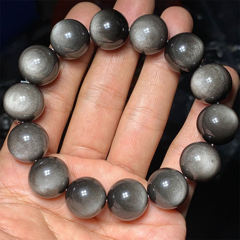 Braccialetto di protezione lenitiva in ossidiana lucida d'argento naturale Buddha Stones