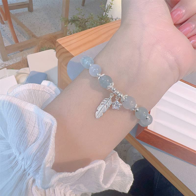 Bracciale con ciondolo a forma di stella di piuma con occhio di gatto e acquamarina in argento sterling 925 Buddha Stones