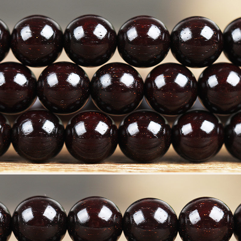 Braccialetto di protezione con nodo cinese in legno di sandalo rosso con piccola foglia e stella d'oro Buddha Stones
