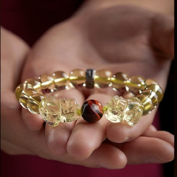 Braccialetto di protezione della prosperità con occhio di tigre PiXiu e citrino naturale Buddha Stones