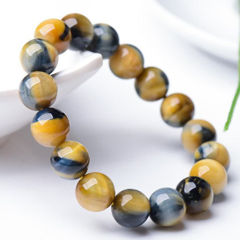 Braccialetto di protezione e forza con occhio di tigre Buddha Stones