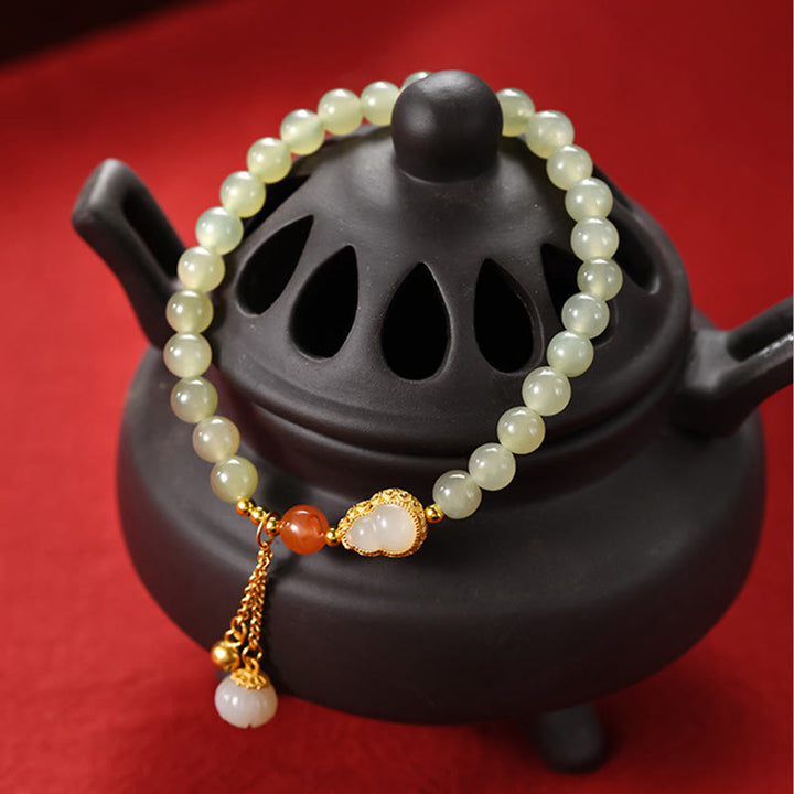 Braccialetto portafortuna in argento sterling 925 con giada Hetian e zucca di loto