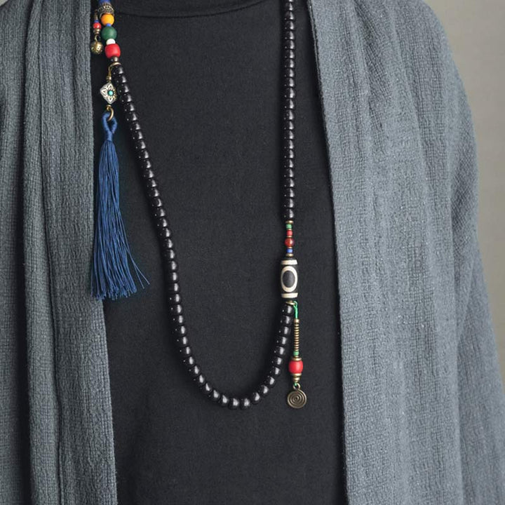 Buddha Stones 108 Perline Mala Legno di Ebano Dzi Perline Rame Braccialetto con Nappa
