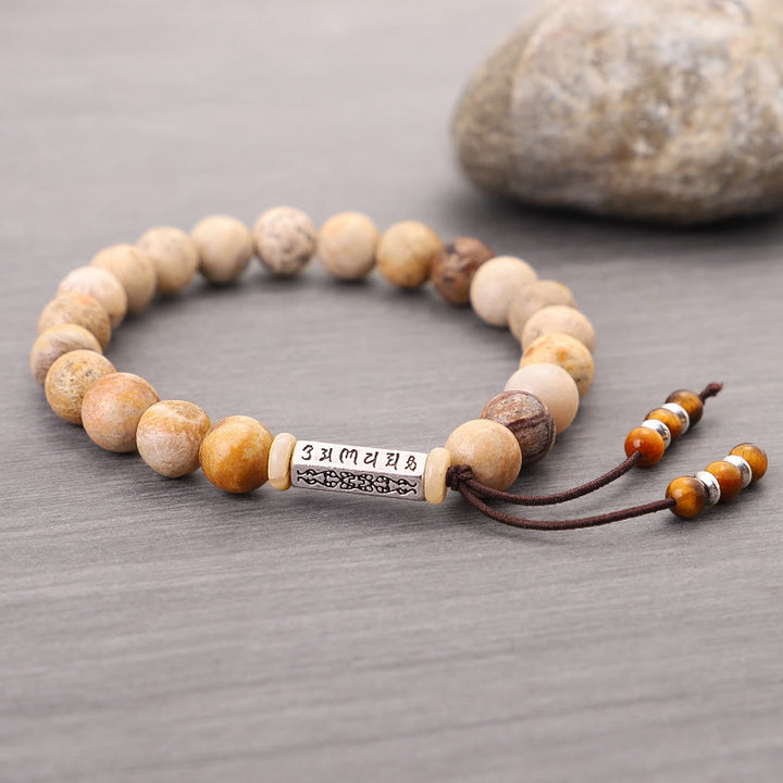 Braccialetto rinforzante in pietra invecchiata Om Mani Padme Hum Buddha Stones
