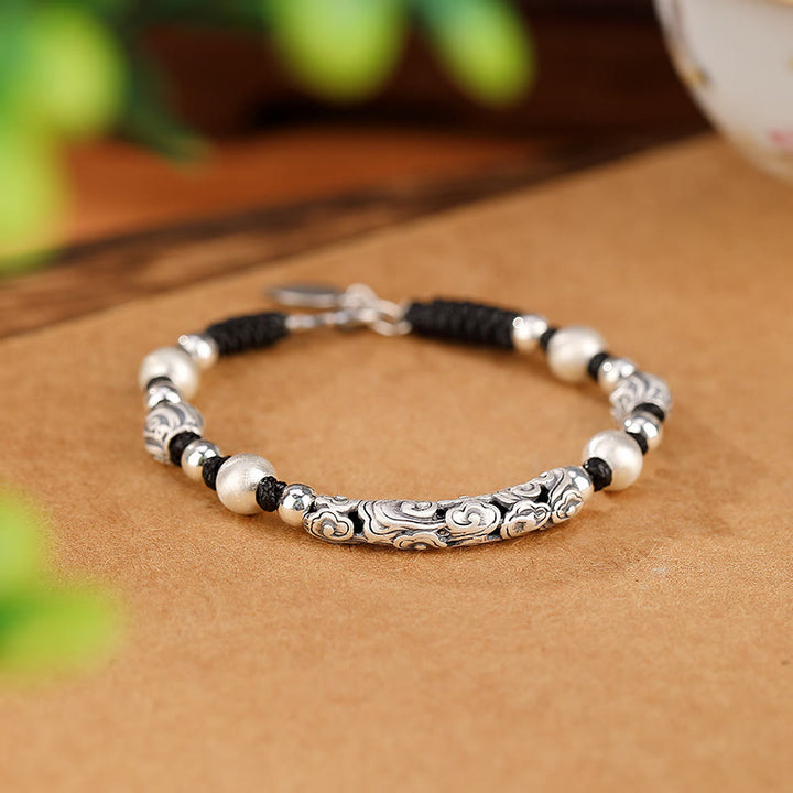 Braccialetto di corda di ricchezza con nuvola di buon auspicio in argento sterling 999 fatto a mano in rame Buddha Stones in Tibet