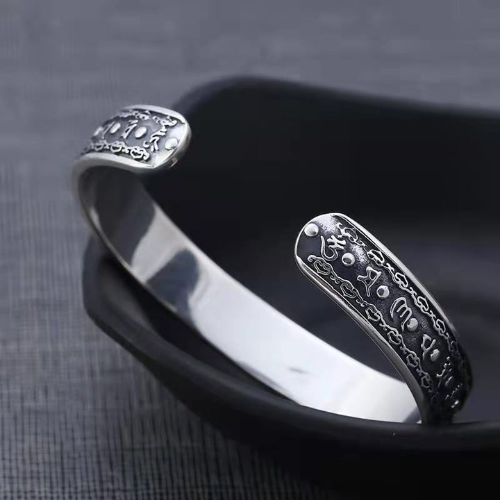 Bracciale rigido con Buddha Stones in argento sterling 925 Om Mani Padme Hum con doppio Dorje inciso e saggezza