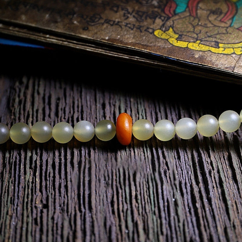Braccialetto della fortuna in ambra e corno di pecora del Tibet con 108 perle di Mala Buddha Stones