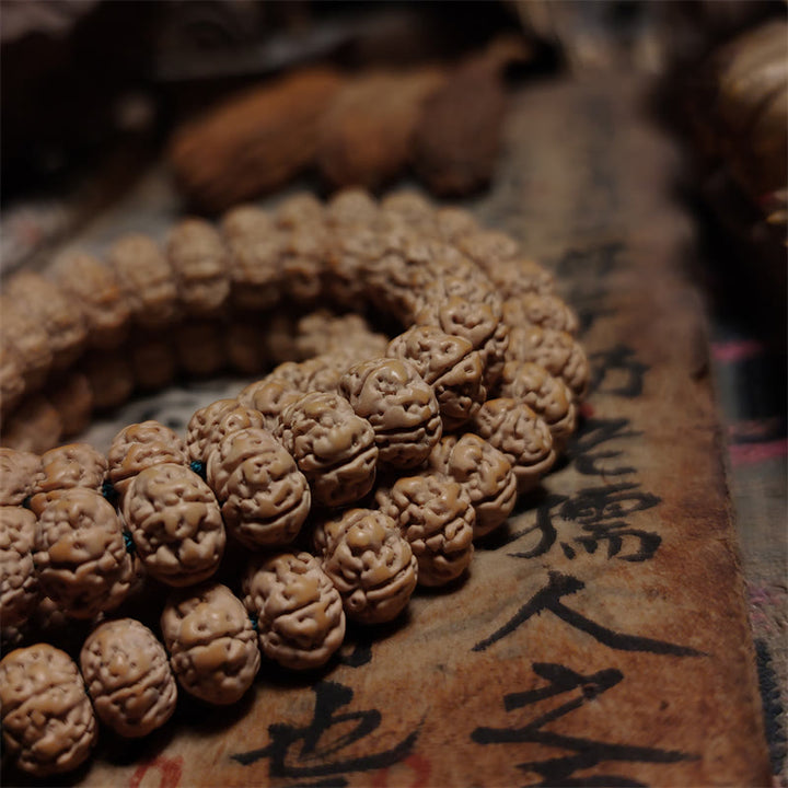 Braccialetto a quattro giri con 108 perle Mala Rudraksha Bodhi Seed Luck Wealth Tassel