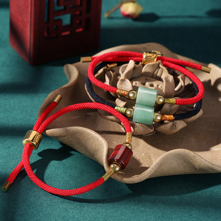 Braccialetto in corda intrecciata con protezione dalla fortuna in malachite, fatto a mano in Tibet, con Buddha Stones verde e pietra rossa