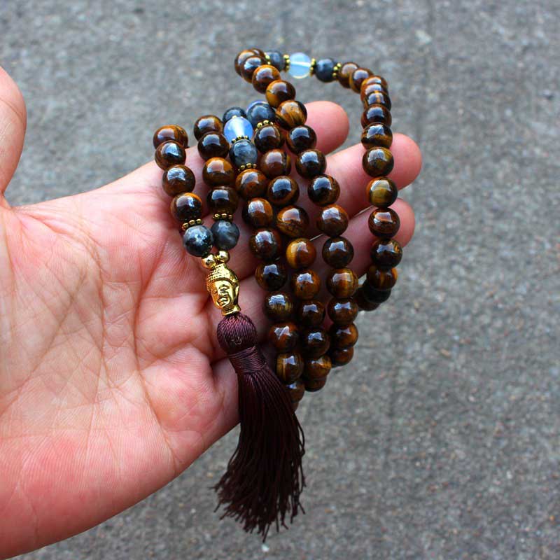 Collana con ciondolo a forma di nappa con Buddha Stones