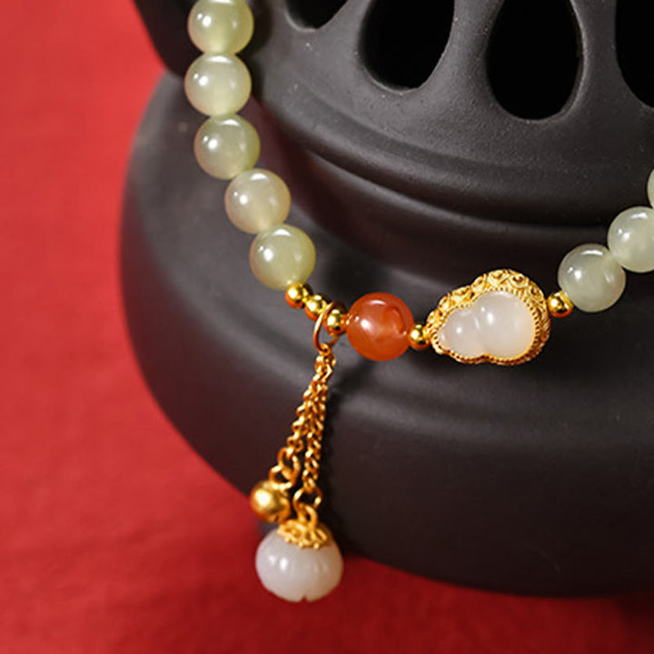 Braccialetto portafortuna in argento sterling 925 con giada Hetian e zucca di loto