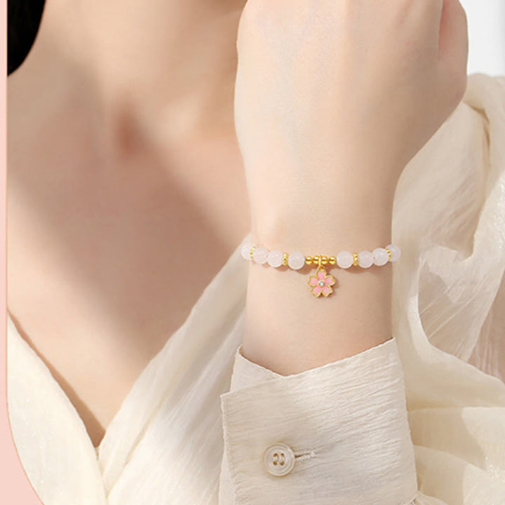 Braccialetto di protezione in giada bianca Hetian con fiori di ciliegio in argento sterling 925 Buddha Stones