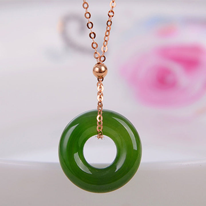 Collana con ciondolo in oro 14K con giada ciano rotonda e guarigione