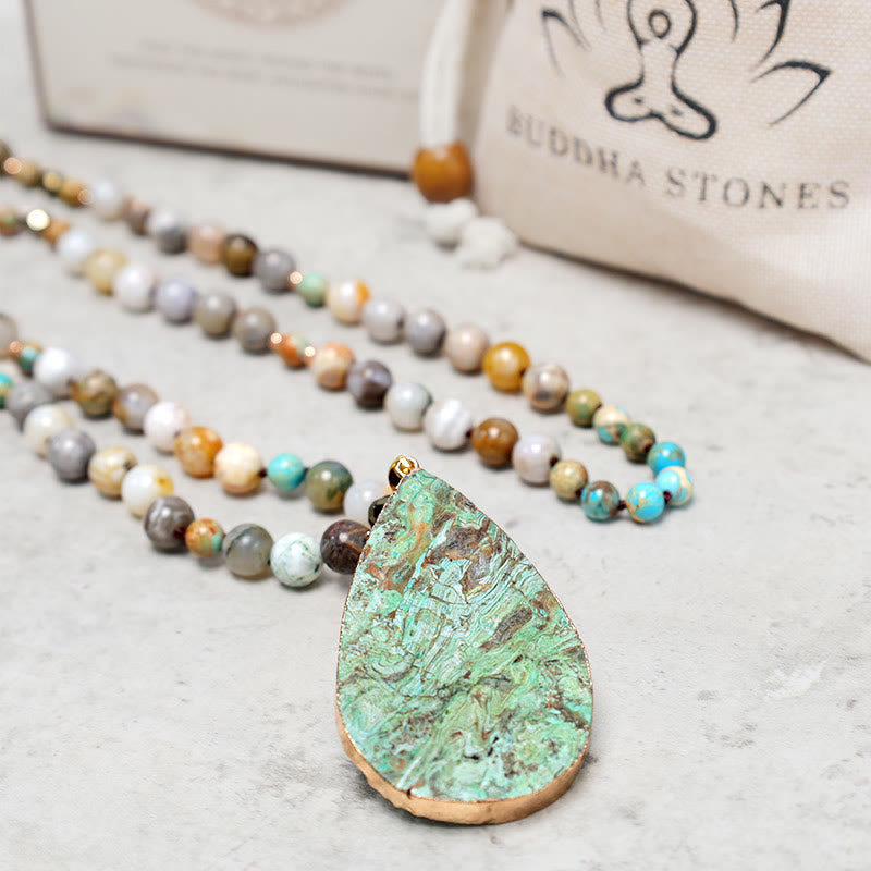 Collana di perline di guarigione in diaspro Picasso naturale dell'oceano Buddha Stones
