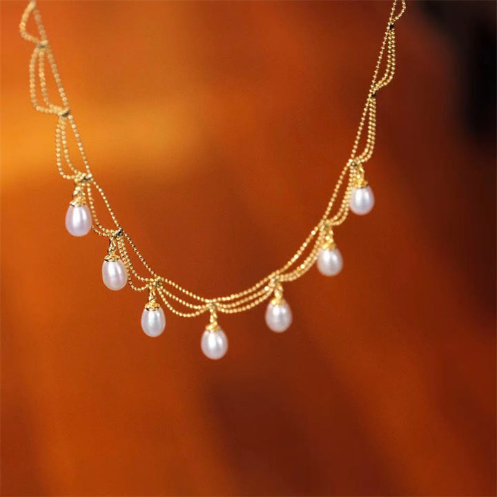 Collana con ciondolo multistrato di perle curative placcate in oro 14K vintage