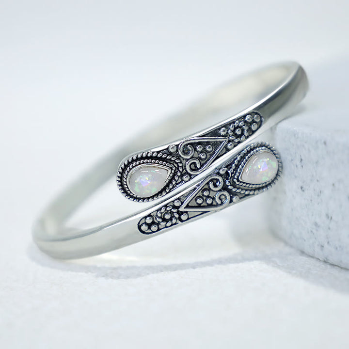 Braccialetto con polsino curativo con motivo a goccia d'acqua in zircone Buddha Stones