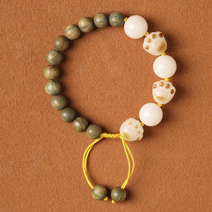 Braccialetto di cura per artigli di zampa di gatto con semi di Bodhi di sandalo verde naturale Buddha Stones - Sandalo verde e semi di Bodhi (circonferenza del polso 14-15 cm) - image 1