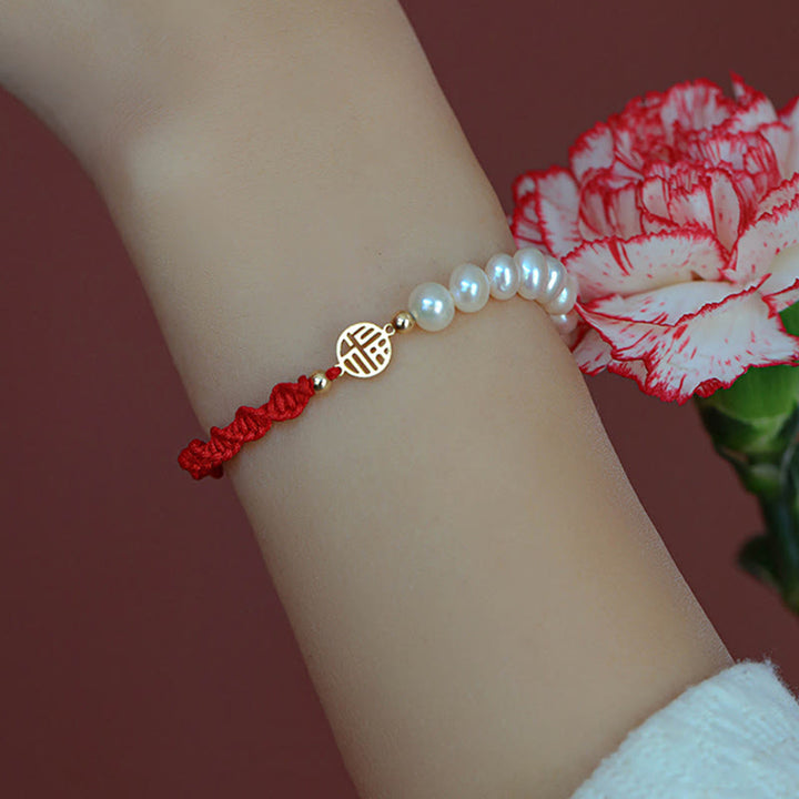 Braccialetto con treccia rossa e perle placcate in oro 14K e protezione dalla fortuna