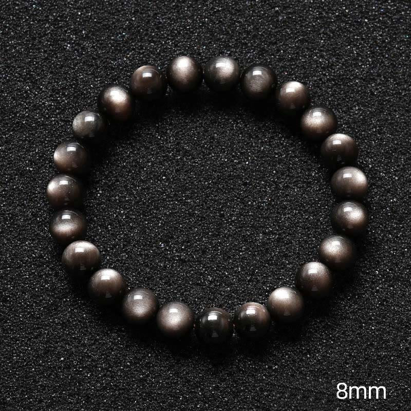 Braccialetto di protezione lenitiva in ossidiana lucida d'argento naturale Buddha Stones