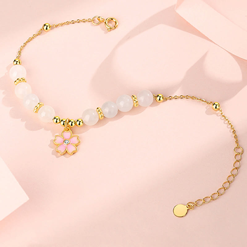Braccialetto di protezione in giada bianca Hetian con fiori di ciliegio in argento sterling 925 Buddha Stones