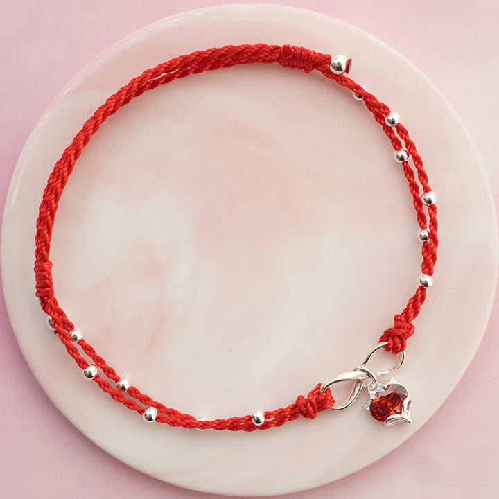 Cavigliera intrecciata con Buddha Stones, simbolo dell'amore, cuore e infinito