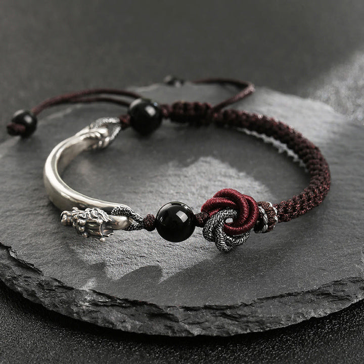 Bracciale intrecciato a mano in argento sterling 925 con drago di buon auspicio Buddha Stones