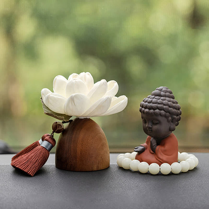 Decorazione di cura calma con fiore di Buddha in legno di pesca nera