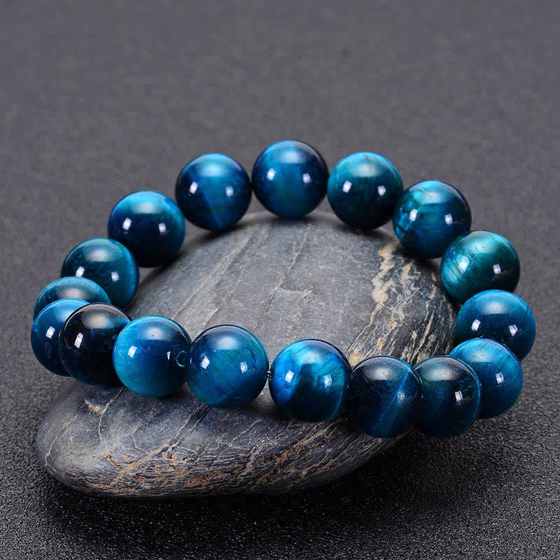 Braccialetto di protezione con occhio di tigre blu Buddha Stones - image 1