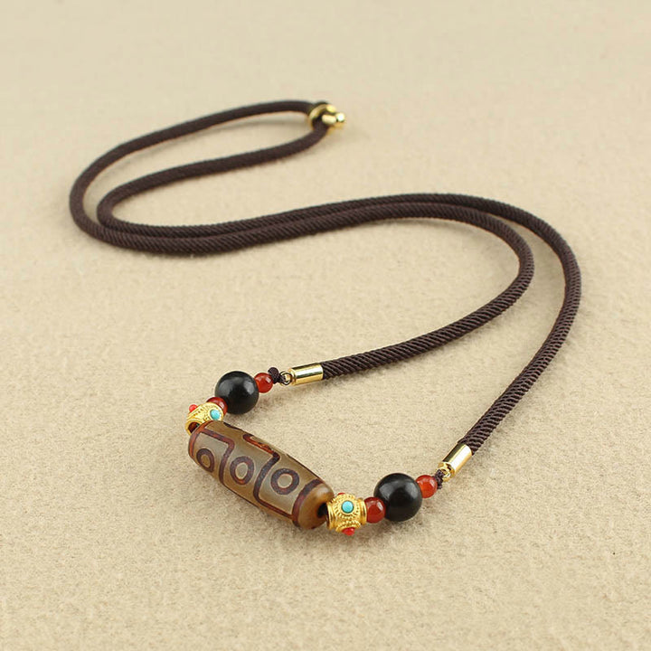 Buddha Stones Tibetano Nove Occhi Dzi Bead Protezione Benedizioni Collana Pendente