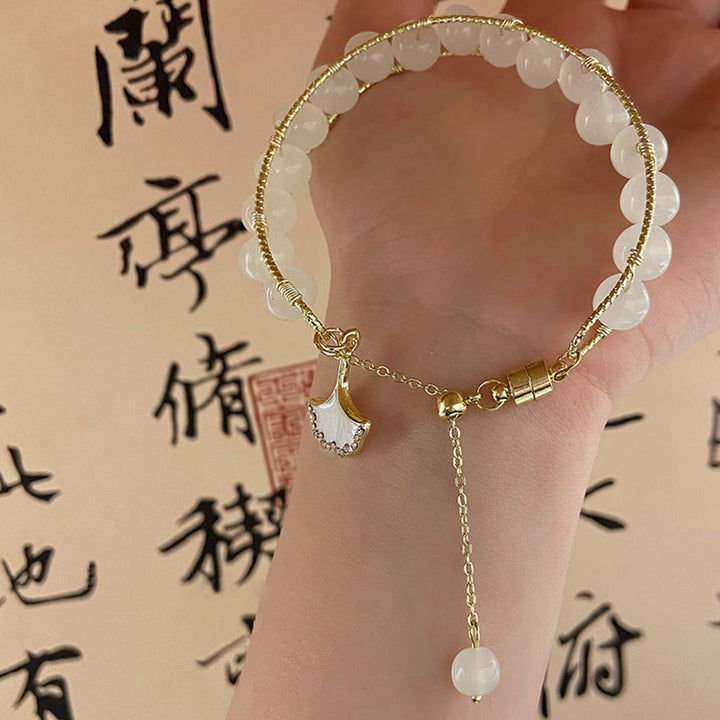 Braccialetto della fortuna con perline di giada e foglie di ginkgo di Buddha Stones