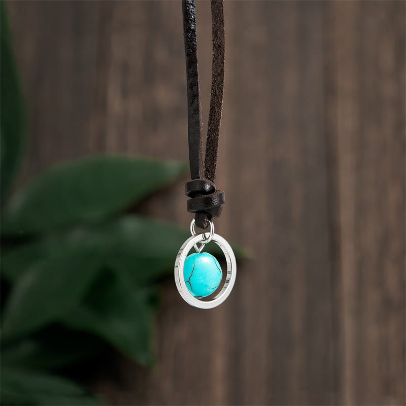 Collana con ciondolo in pietra turchese rotonda con pietre Buddha Stones e forza di protezione - image 1