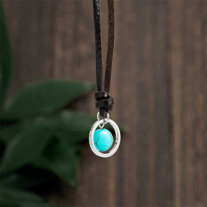 Collana con ciondolo in pietra turchese rotonda con pietre Buddha Stones e forza di protezione