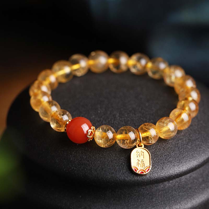 Braccialetto con ciondolo della fortuna in agata rossa e citrino Buddha Stones