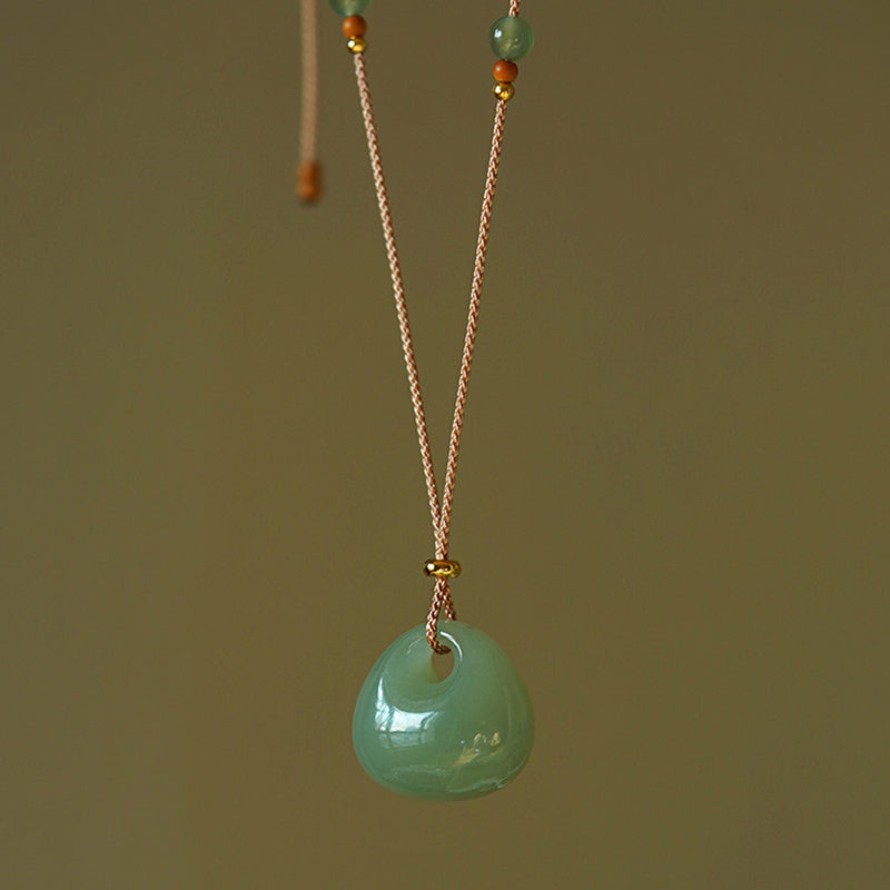 Collana con ciondolo portafortuna e prosperità in giada naturale Buddha Stones. - Giada naturale (il colore può variare) + filo - image 0