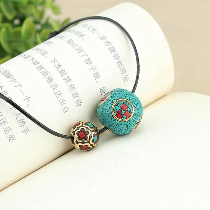 Collana con ciondolo con doppia perla turchese tibetana Buddha Stones, protezione e forza