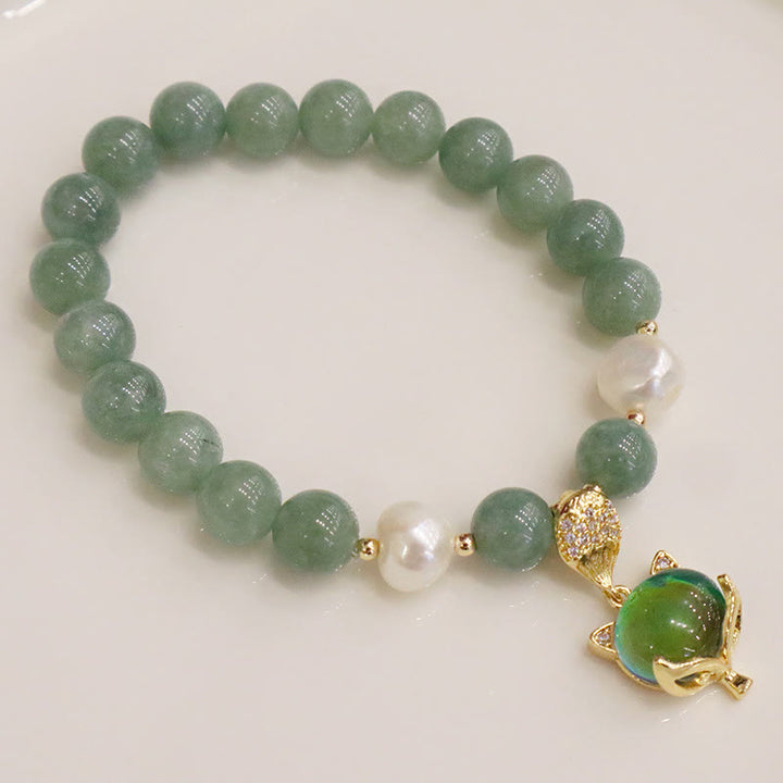 Braccialetto portafortuna con ciondolo volpe che cambia colore, perle di giada e Buddha Stones