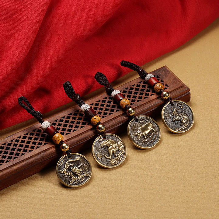 Portachiavi con decorazione in rame con zodiaco cinese e fortuna