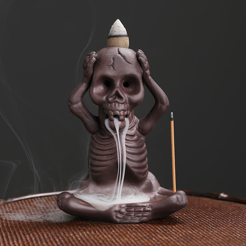 Buddha Stones Piccolo teschio Fantasma Argilla viola Fontana di fumo a riflusso Bruciatore di incenso della pace Decorazione